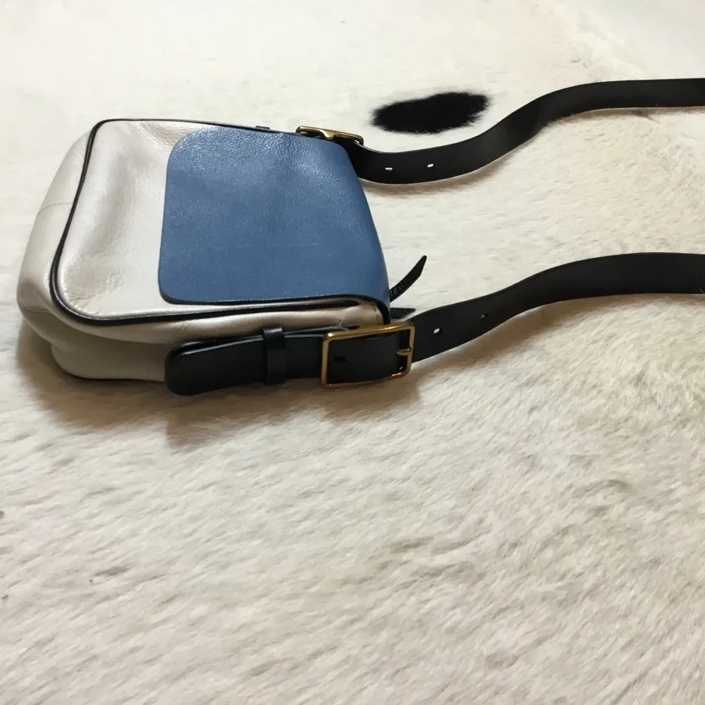 Fossil Harper Small Saddle Crossbody bag, blue and white leather design.